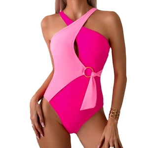 Contrast pink one-piece swimsuit with cutout detail and a gold ring waist accent