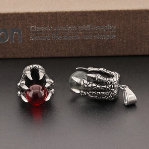 Gothic stainless steel dragon claw jewelry set with red and green gemstone accents