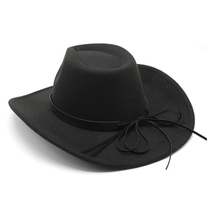 Detail of classic black wool felt jazz hat with leather band and small side bow detail