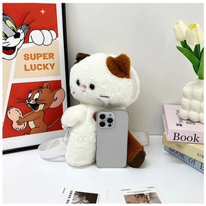Cute calico cat plush crossbody bag shown with a smartphone for size comparison