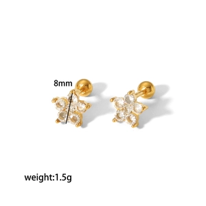 Detailed view of 8mm gold flower stud earrings with clear zircon stones, weighing 1.5g