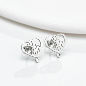 Silver geometric heart earrings with musical note symbols on a clean white background
