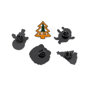 Cute enamel Christmas pins featuring Santa, snowman, and tree with metal backings