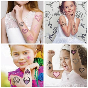 Cartoon Y2K waterproof heart tattoo stickers for kids party featuring pink and black designs