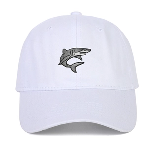 White cotton baseball cap with detailed shark embroidery and a curved brim