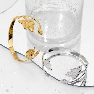 Elegant lotus floral open adjustable stainless steel bracelet in gold and silver finish