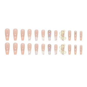 Sparkling French press-on nails with 3D pearl bows and rhinestones on coffin shape