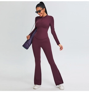Women's burgundy yoga set with half-zip long sleeve top and V-waist flared pants