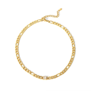 Detail of 18K gold plated Figaro necklace featuring a square zircon pendant on white background