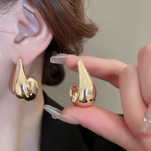 Polished minimalist gold teardrop hoop earrings for women in a chic geometric design
