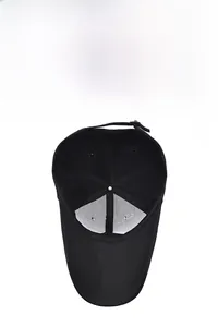 Detail of breathable inner mesh design and stitched structure of a black baseball cap