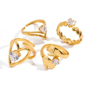 Set of four 18K gold plated stainless steel open rings with heart zircon designs