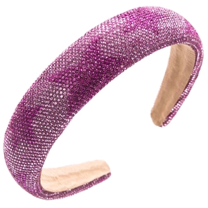 Detail of wide pink velvet headband with shimmering crystal star and sponge lining