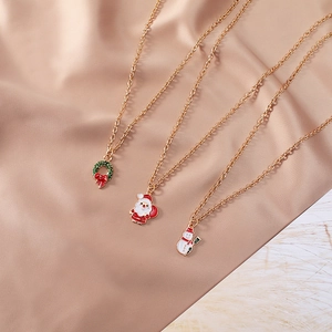 Christmas necklaces with Santa, Snowman and Wreath pendants on rose gold chain