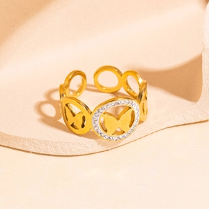 Adjustable hollow butterfly ring in gold finish with micro-pave crystals on matte stone