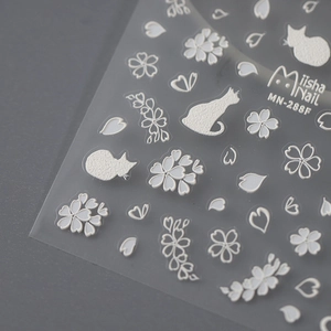 Cute white embossed cat and cherry blossom nail stickers on a dark gray background