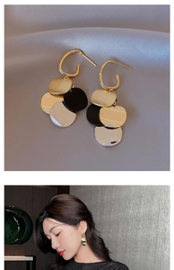 Detail view and model wearing vintage contrast color round fringe tassel earrings