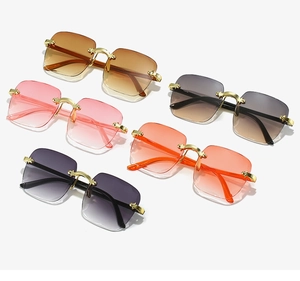 Collection of frameless square sunglasses in multiple gradient tints with gold metal bridge