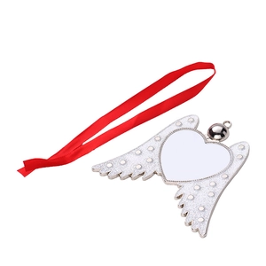 Detail of silver angel wing heart pendant with red ribbon and glitter texture for sublimation