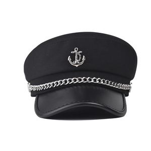 Black nautical captain hat featuring silver anchor emblem and chain on white background