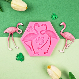 Pink flamingo and monstera leaf silicone mold for chocolate and fondant cake decorating