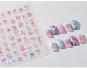 Detail of TL-337 nail stickers with pink bows, moon wands, and dreamy pastel heart patterns