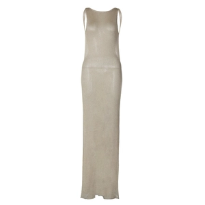 Detail of light gold sheer knitted fabric on long dress with subtle metallic luster