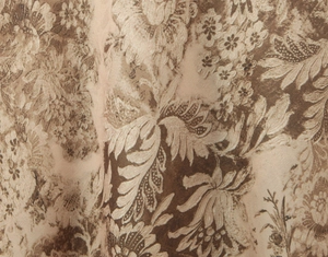 Macro shot of retro floral print fabric on a slim fit elegant bodycon dress