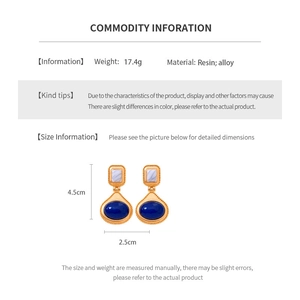 Detailed size specifications for vintage resin and alloy oval earrings in golden finish