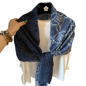 Dark blue linen scarf with white polka dots and geometric patterns and fringe detail