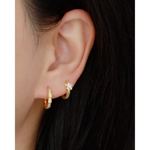 S925 sterling silver gold snake scale earrings with sparkling cubic zirconia on model