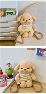 Detail view of a plush dog backpack with a yellow lace collar and adjustable straps