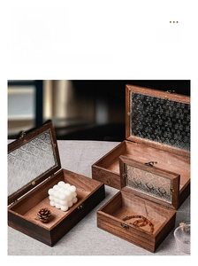 Three sizes of vintage wooden boxes with patterned glass lids and metal latches