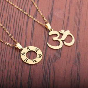 Gold stainless steel yoga necklace with Om symbol and Sanskrit engraved pendant