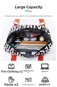 Top view of spacious interior storage for 3-5 days travel gear in alphabet print duffel bag