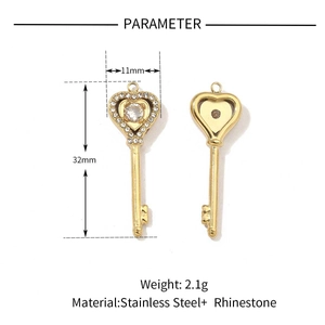 Detail of gold stainless steel heart key pendant with rhinestones and size parameters