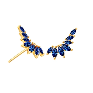 Close-up of crescent wing earrings with blue marquise-cut stones and golden plating
