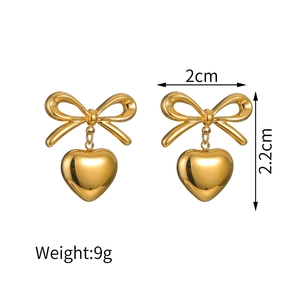 Detailed size specifications for gold heart bow earrings showing 2.2cm height and 9g weight