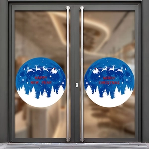 Blue Christmas window stickers with Merry Christmas text and reindeer on a glass shop front