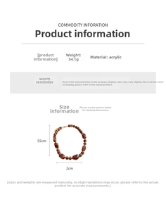 Détail du collier ethnique en acrylique de 55 cm avec perles ambre 2 cm et fermoir doré