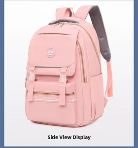 Detail view of pink waterproof school backpack with breathable mesh straps and buckles