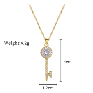 Detailed close-up of golden zircon key pendant with weight and size specifications