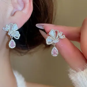 Silver butterfly drop earrings with pink water-drop zircon and white shell inlay