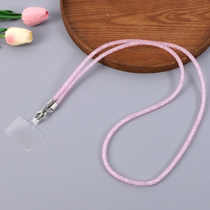 Pink glitter phone lanyard with metal clasps and transparent insert for crossbody wear