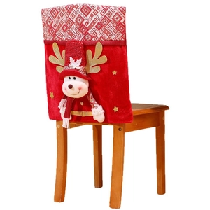Christmas chair back cover with 3D reindeer doll and red velvet fabric on white background