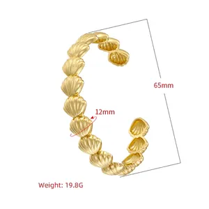 Ocean style gold adjustable shell bangle with radial texture, diameter 65mm weight 19.8g