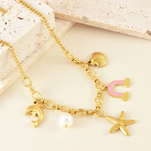 Close-up of gold ocean necklace with dolphin, starfish, shell and white pearl charms