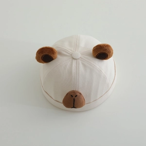 Close-up of baby bear beanie showing cotton twill fabric and 3D animal ear details