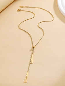 Detail of adjustable gold geometric Y-necklace with triangular pendants and lobster clasp