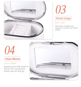 Detail of PU leather jewelry box with silver metal edges and built-in mirror inside